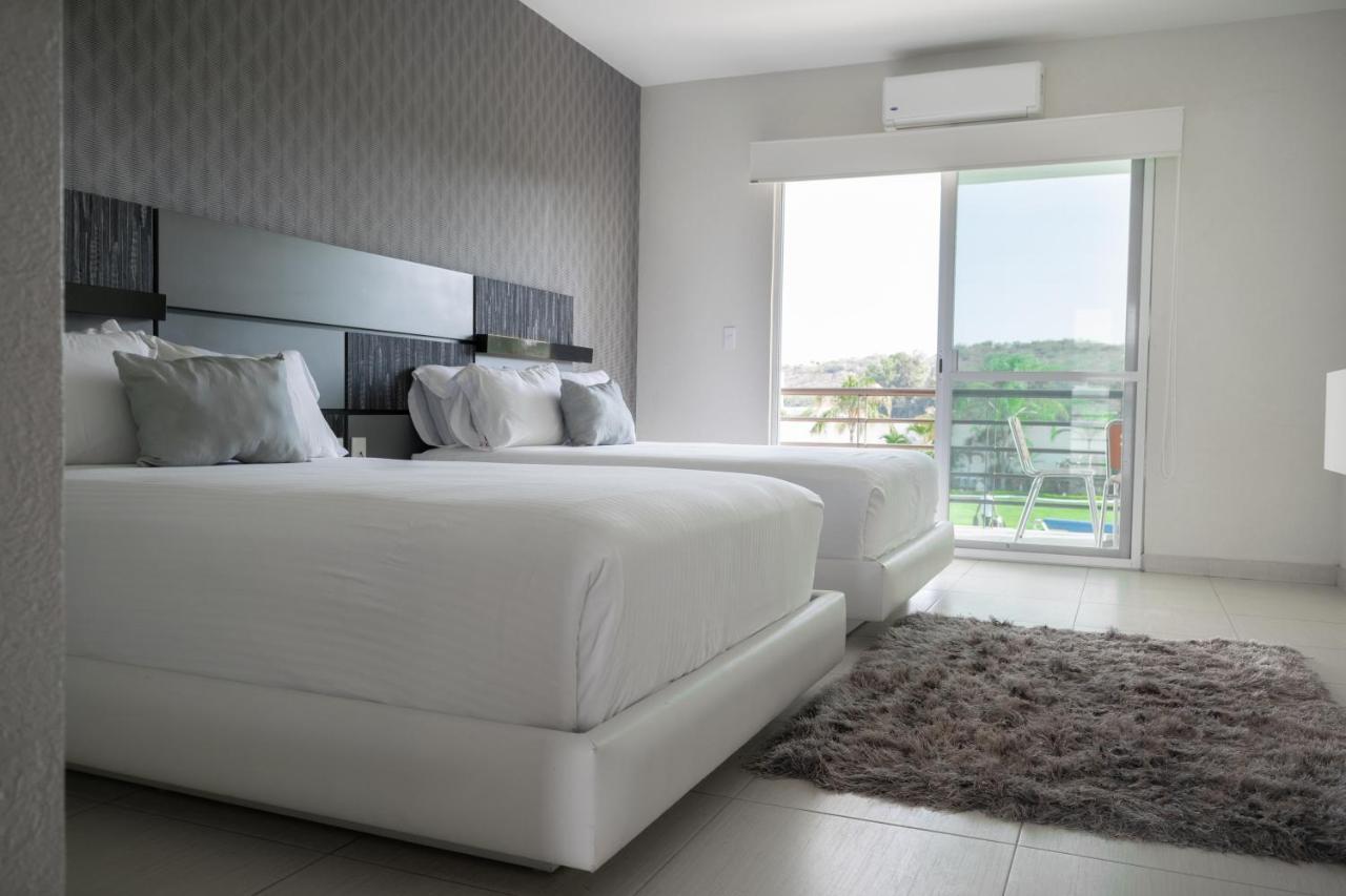 Hotel Aquetzalli ココヨック エクステリア 写真